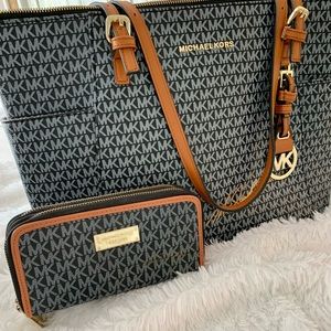 Large Black Michael Kors bag and double zipper zip around wallet
